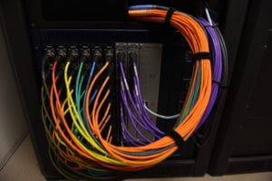 SPEEDWRAP®_Hook_and_Loop__Cable_Tie_Application_Datacom_2 (1) - Speedtech International Medical velcro straps organizing computer area