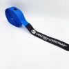 A coiled blue strap with a black pointed end, labeled "VELCRO® Brand LOGISTRAP® Pallet Straps," shown on a white background.