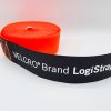 A rolled-up orange VELCRO® Brand LOGISTRAP® Pallet Strap with a black end labeled in white, displayed on a plain white background.
