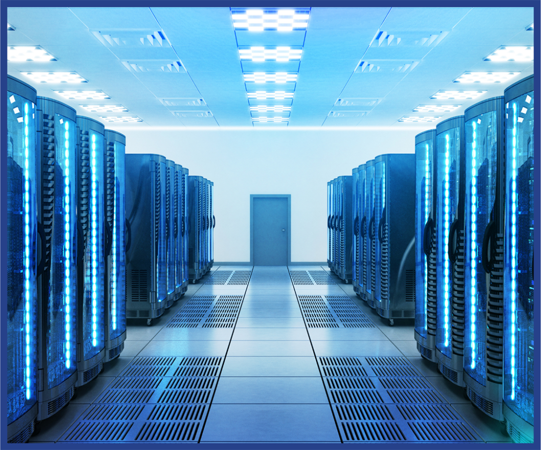 A brightly lit server room with rows of blue-lit server racks on both sides and a closed gray door at the far end, viewed from the center aisle.