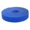 A roll of Speedtech Test Product blue hook-and-loop tape is tightly coiled with the textured side visible on a plain white background.