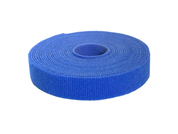A roll of Speedtech Test Product blue hook-and-loop tape is tightly coiled with the textured side visible on a plain white background.